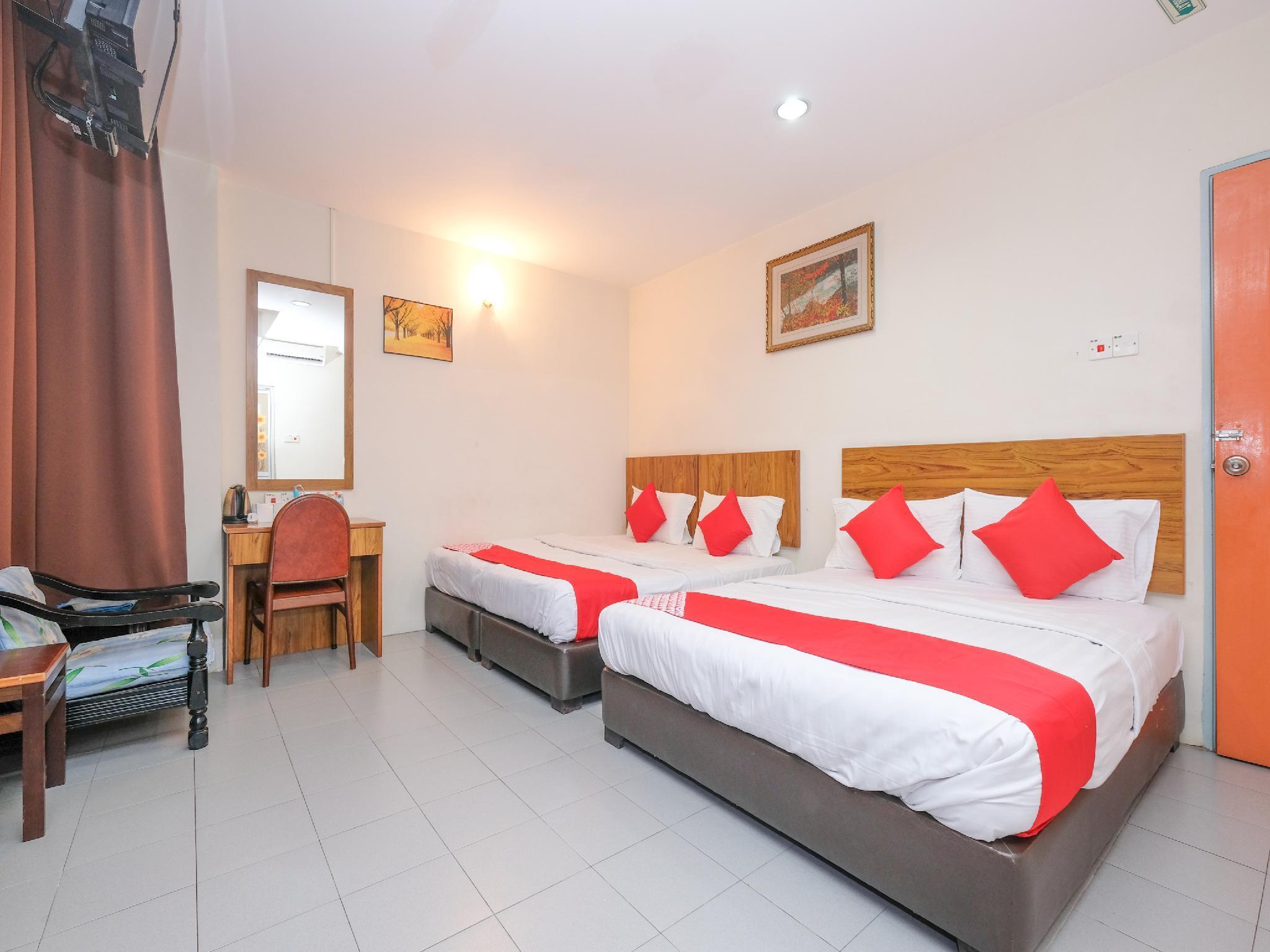 Oyo 89877 Sun Triang Hotel Kampong Kerayong Eksteriør billede