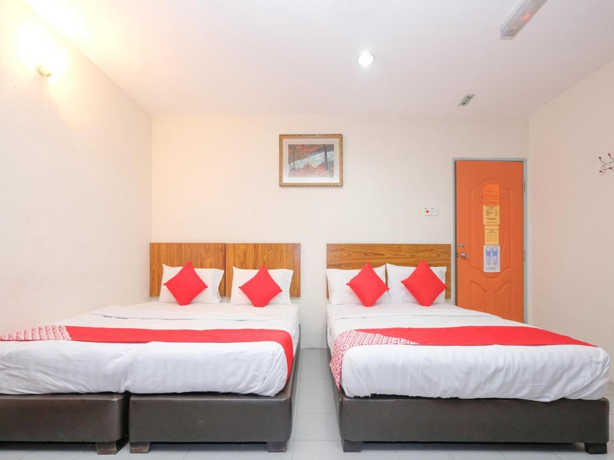 Oyo 89877 Sun Triang Hotel Kampong Kerayong Eksteriør billede